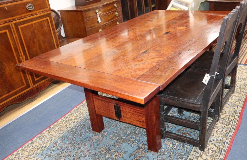An Australian redwood dining table from the workshops of Nicholas Dattner & Co., W.196cm, D.111cm, H.74cm